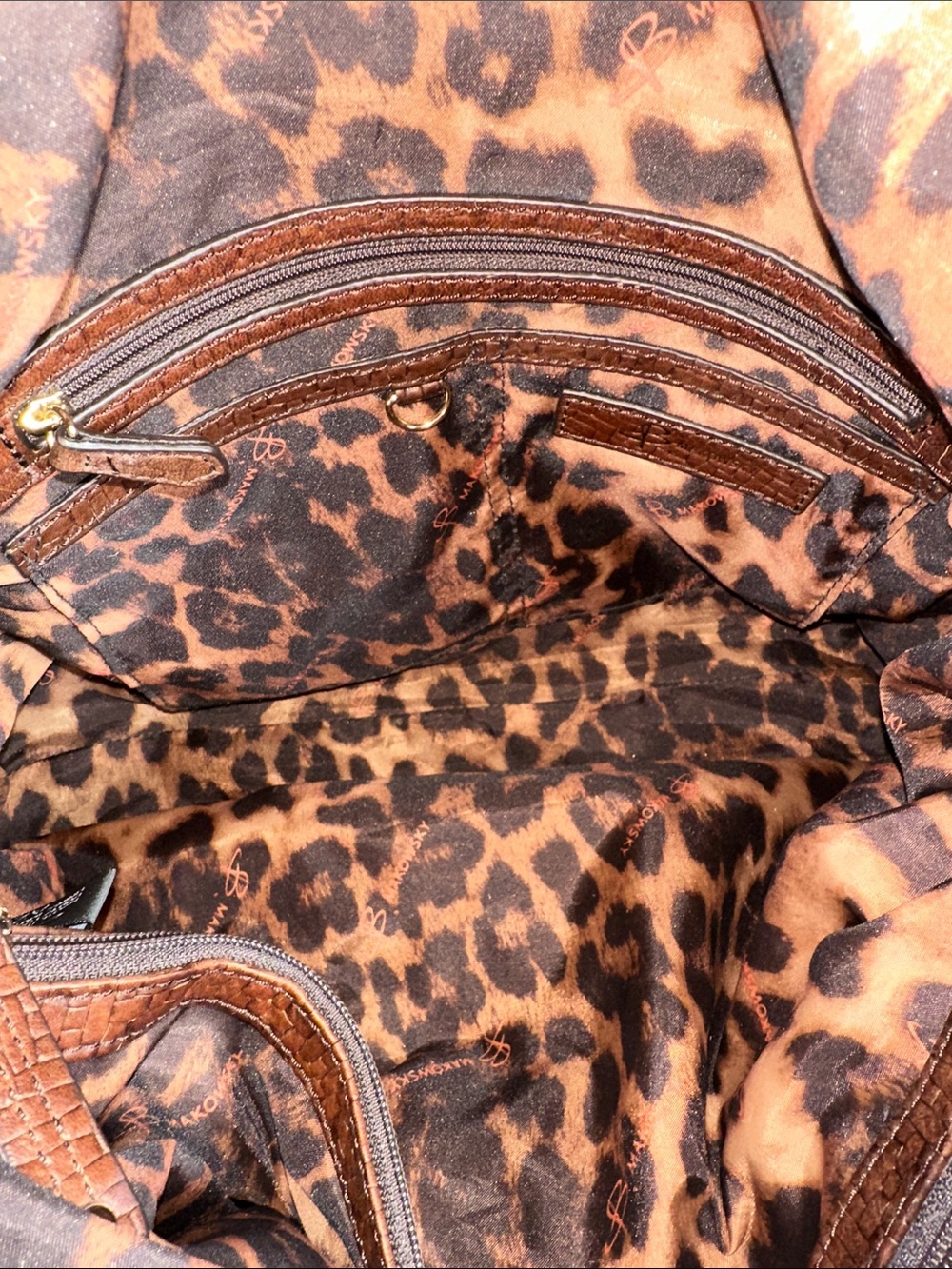 B. Makowsky brown leather shoulder bag with a textured, woven embossed pattern. - Picture 8 of 10